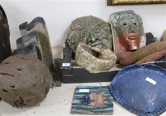 A collection of garden Art pottery sculptures, plaques, etc.